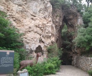 Peking Man cave Cave at Zhoukoudian with model "big-jawed" deer